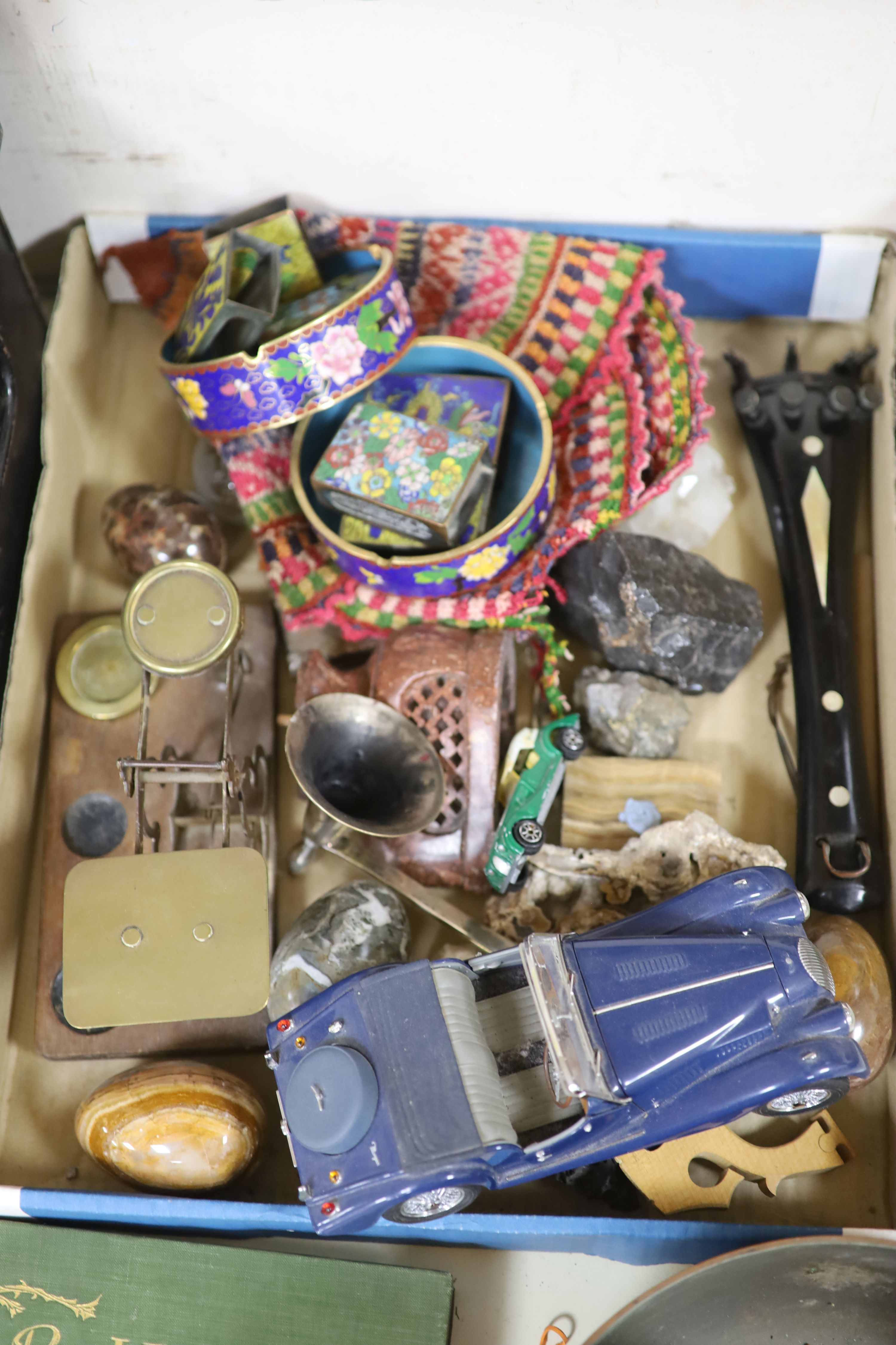 A quantity of mixed collectables to include paper wine labels, toy cars, cloisonne, a book, copper pans etc.